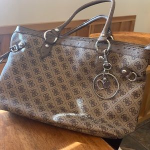 Guess ostrich detailed monogram shoulder bag.